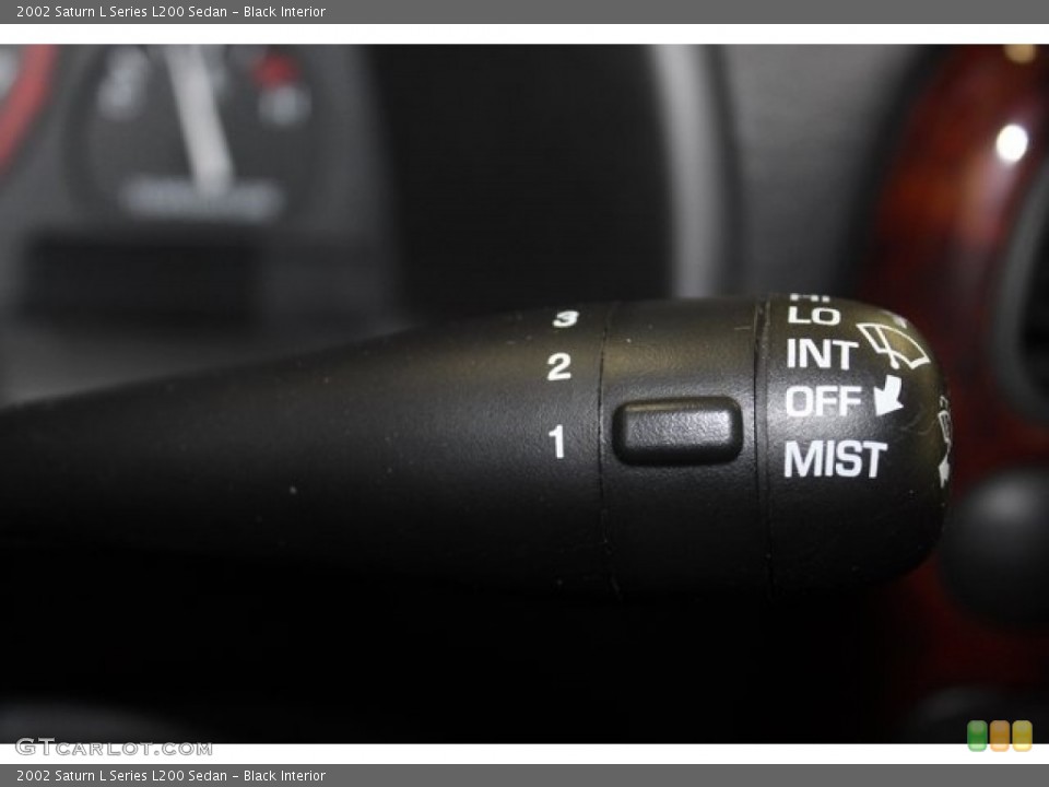 Black Interior Controls for the 2002 Saturn L Series L200 Sedan #101281420