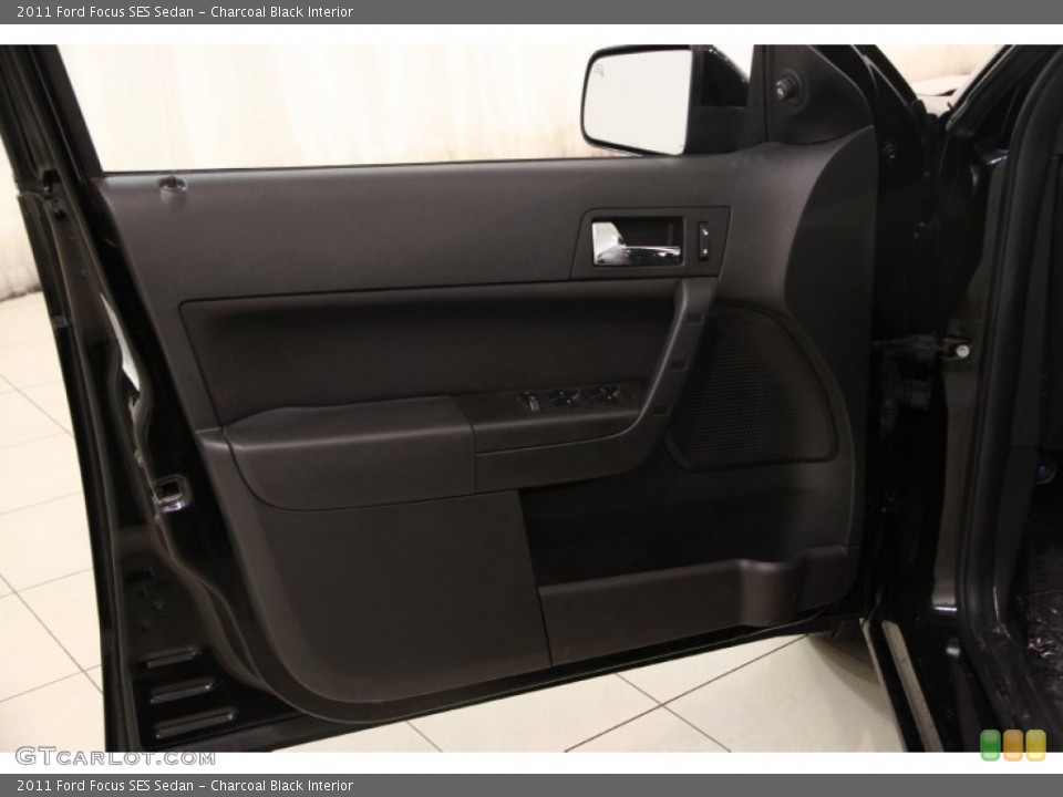 Charcoal Black Interior Door Panel for the 2011 Ford Focus SES Sedan #101332722