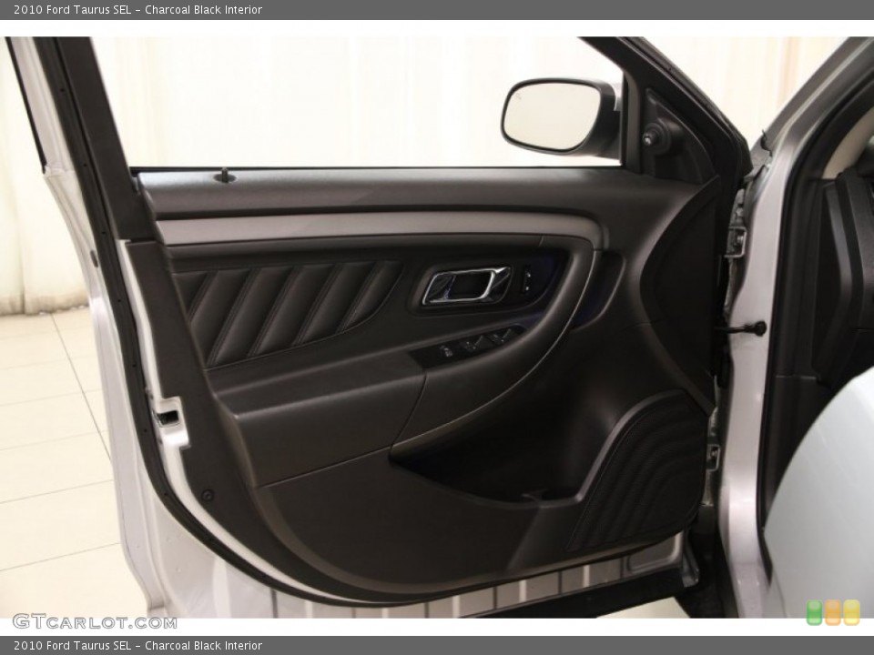 Charcoal Black Interior Door Panel for the 2010 Ford Taurus SEL #101428840