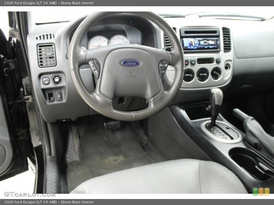 Ebony Black Interior Dashboard for the 2006 Ford Escape XLT V6 4WD #101510195