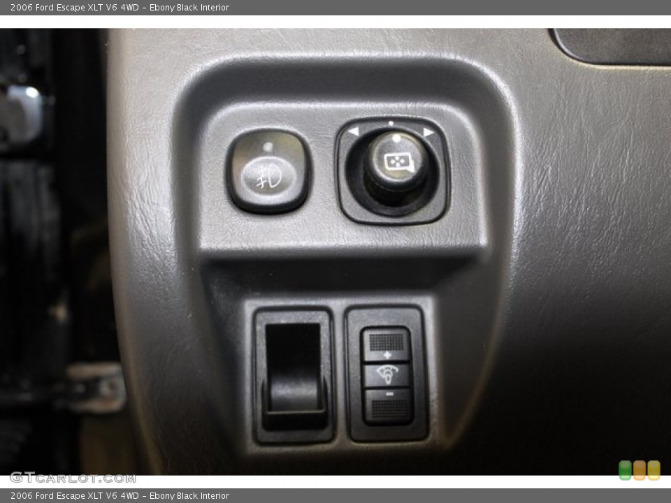 Ebony Black Interior Controls for the 2006 Ford Escape XLT V6 4WD #101510246