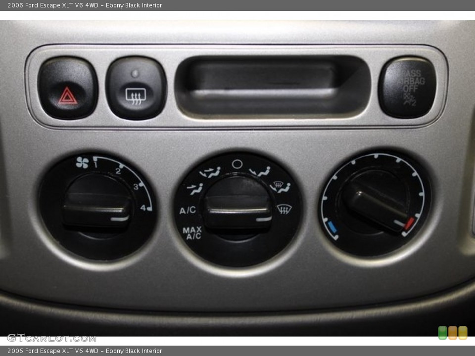 Ebony Black Interior Controls for the 2006 Ford Escape XLT V6 4WD #101510360
