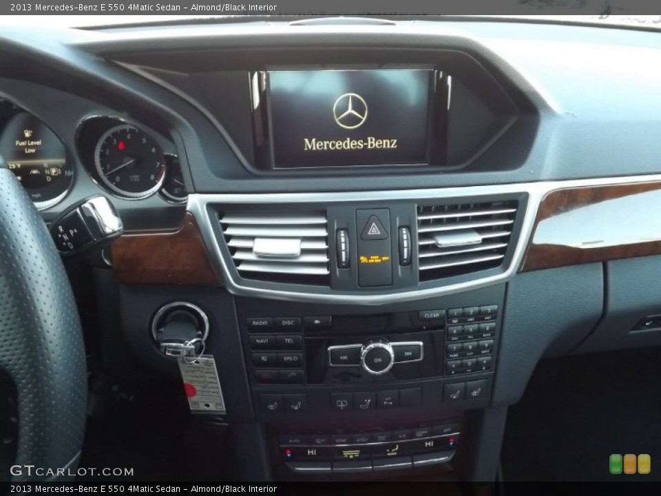 Almond/Black Interior Controls for the 2013 Mercedes-Benz E 550 4Matic Sedan #101519653