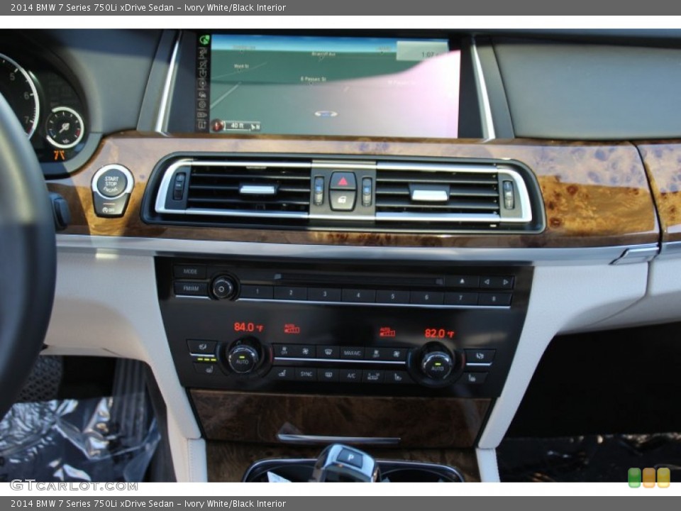 Ivory White/Black Interior Controls for the 2014 BMW 7 Series 750Li xDrive Sedan #101552960