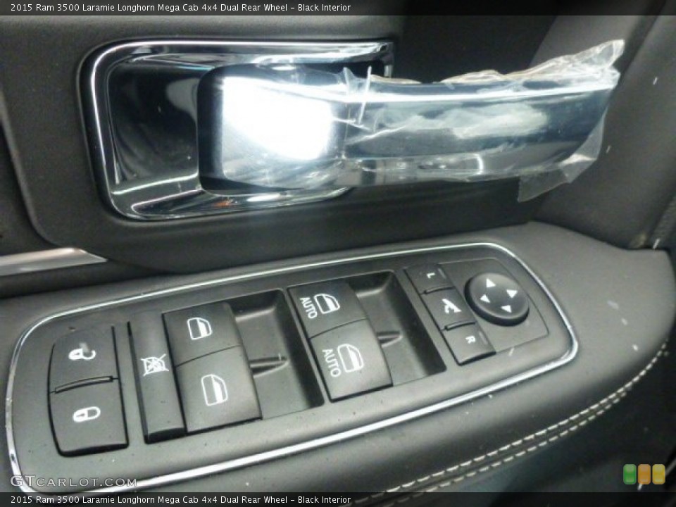 Black Interior Controls for the 2015 Ram 3500 Laramie Longhorn Mega Cab 4x4 Dual Rear Wheel #101650616