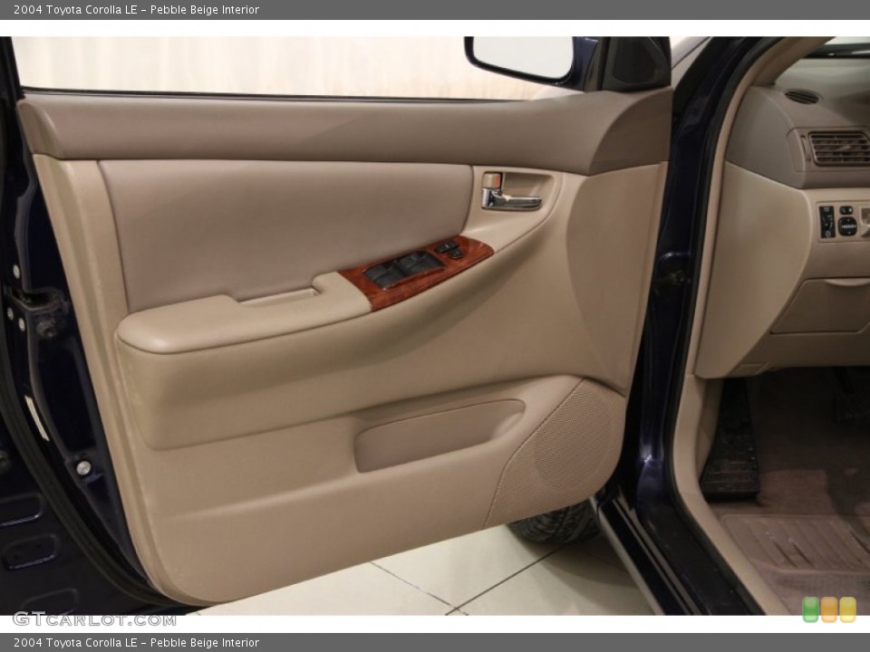 Pebble Beige Interior Door Panel for the 2004 Toyota Corolla LE #101778364
