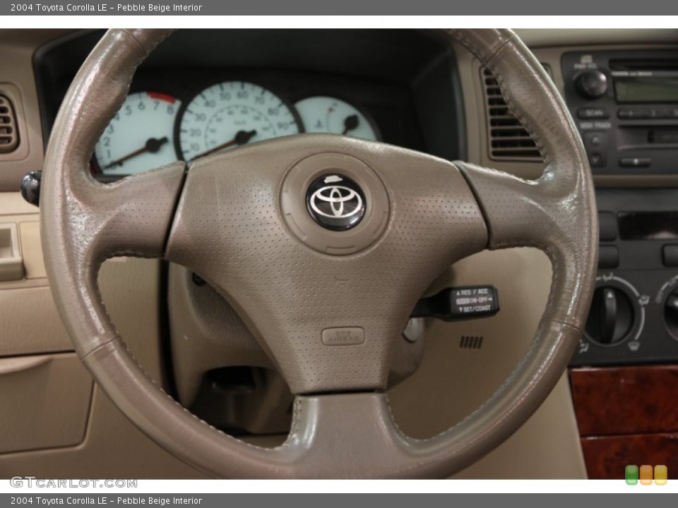 Pebble Beige Interior Steering Wheel for the 2004 Toyota Corolla LE #101778412