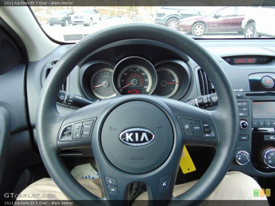 Black Interior Steering Wheel for the 2011 Kia Forte EX 5 Door #101815541
