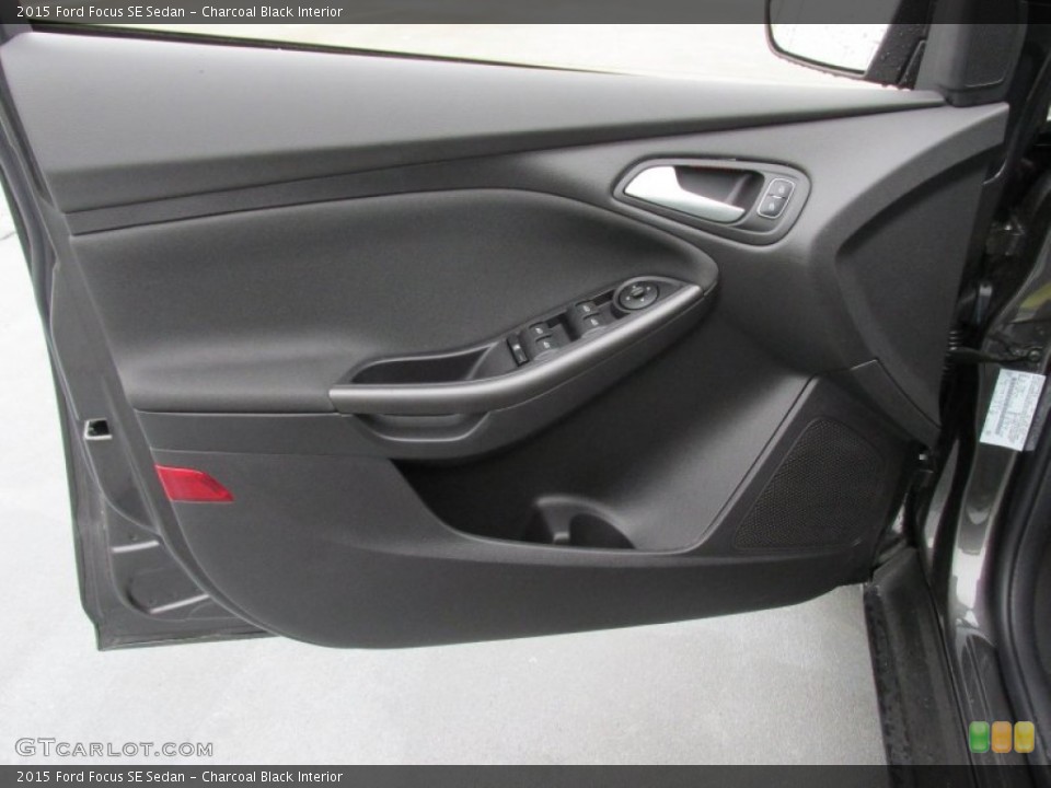 Charcoal Black Interior Door Panel for the 2015 Ford Focus SE Sedan #101905305
