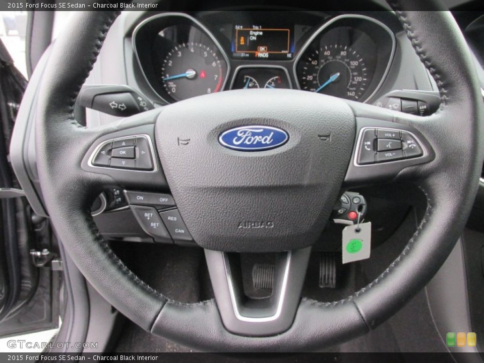 Charcoal Black Interior Steering Wheel for the 2015 Ford Focus SE Sedan #101905395