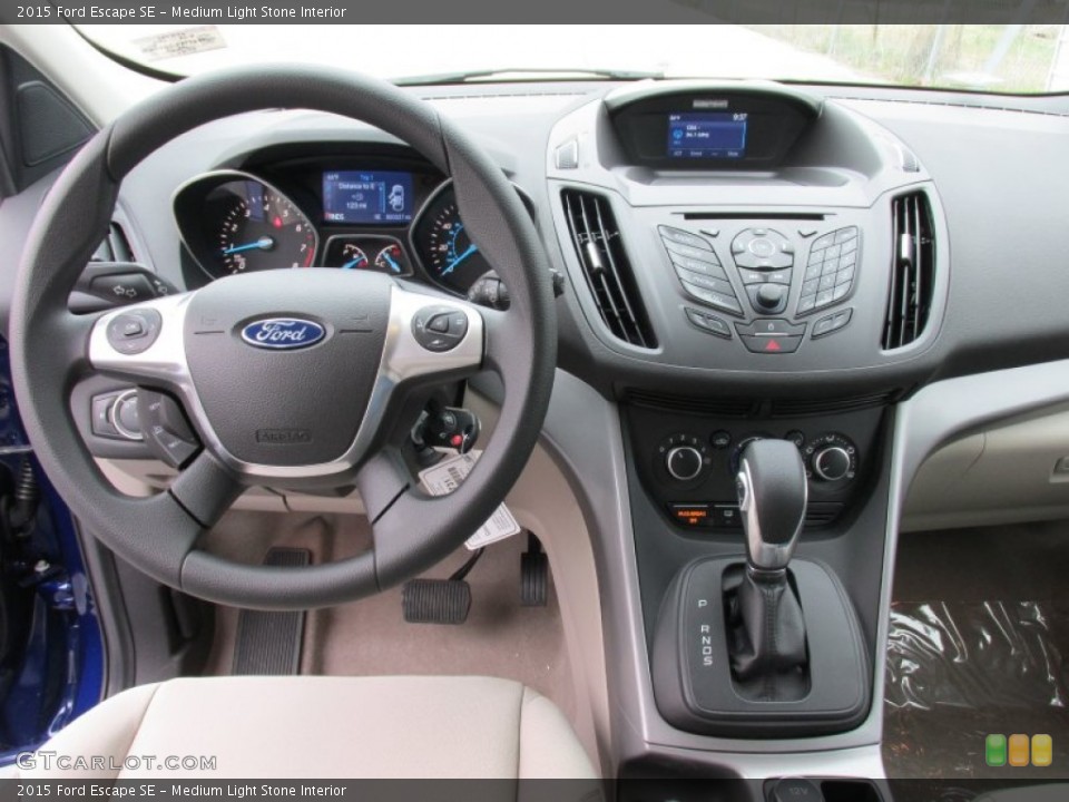 Medium Light Stone Interior Dashboard for the 2015 Ford Escape SE #101931593