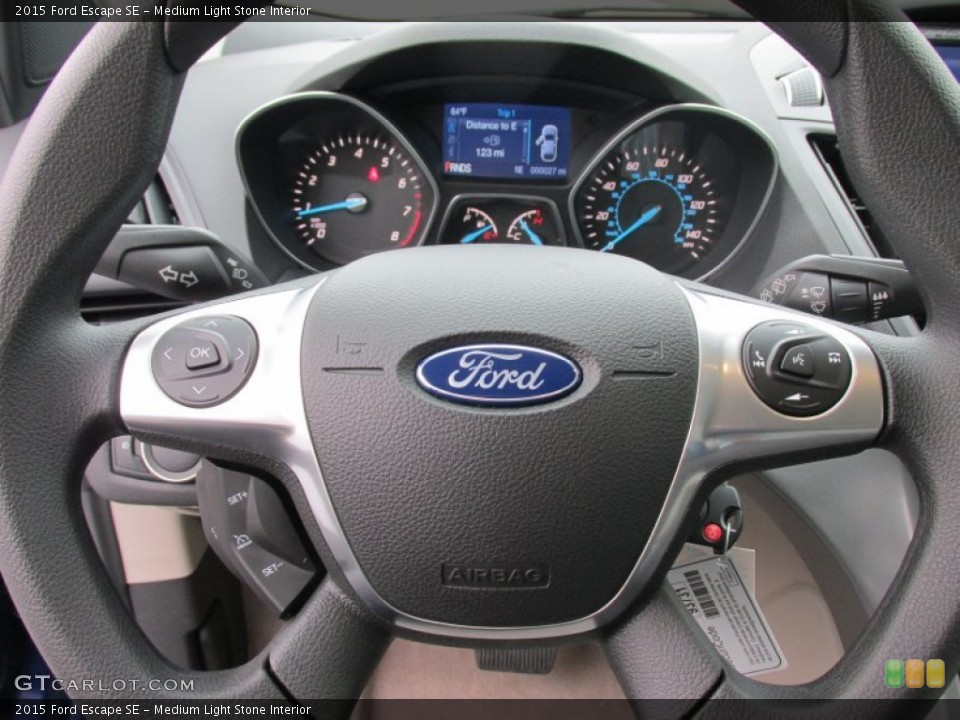 Medium Light Stone Interior Steering Wheel for the 2015 Ford Escape SE #101931740