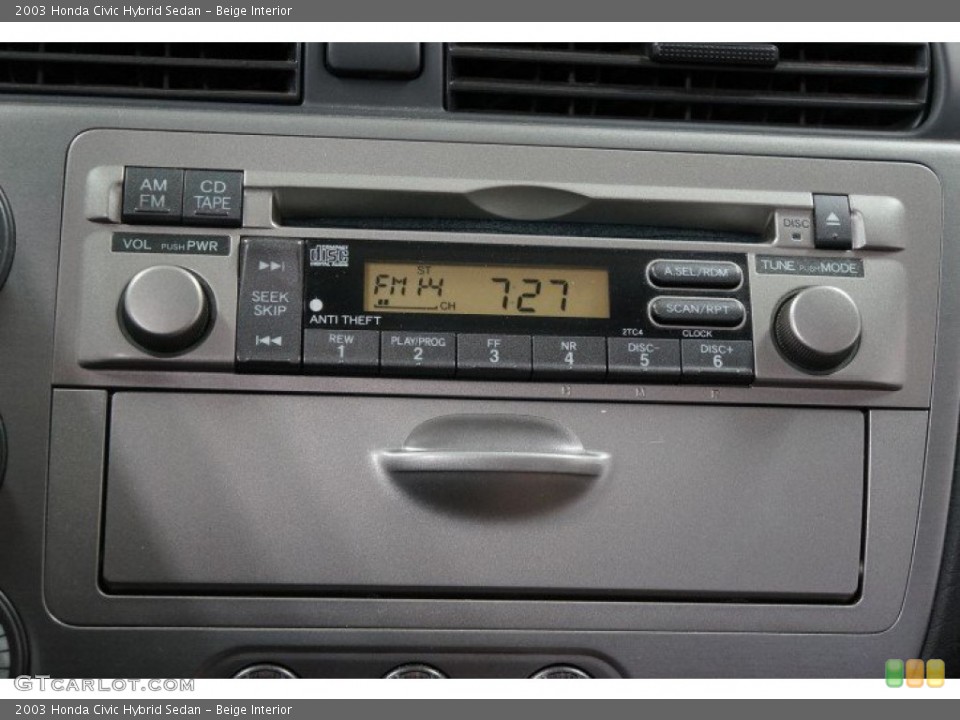 Beige Interior Audio System for the 2003 Honda Civic Hybrid Sedan #101938238