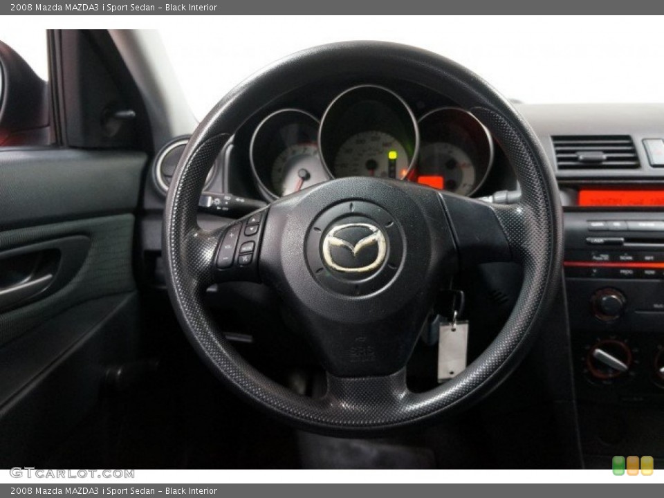 Black Interior Steering Wheel for the 2008 Mazda MAZDA3 i Sport Sedan #101940452