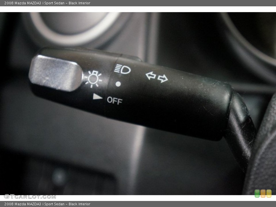 Black Interior Controls for the 2008 Mazda MAZDA3 i Sport Sedan #101940473