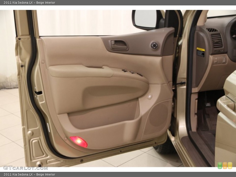 Beige Interior Door Panel for the 2011 Kia Sedona LX #101974409