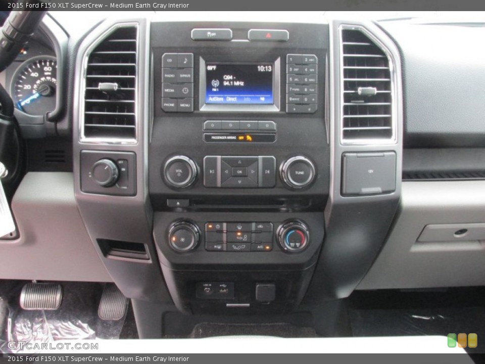Medium Earth Gray Interior Controls for the 2015 Ford F150 XLT SuperCrew #101989718