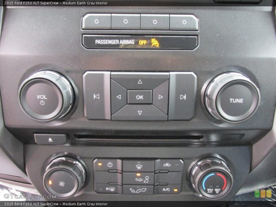 Medium Earth Gray Interior Controls for the 2015 Ford F150 XLT SuperCrew #101989736