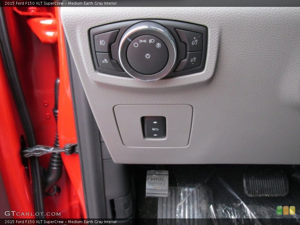 Medium Earth Gray Interior Controls for the 2015 Ford F150 XLT SuperCrew #101989778