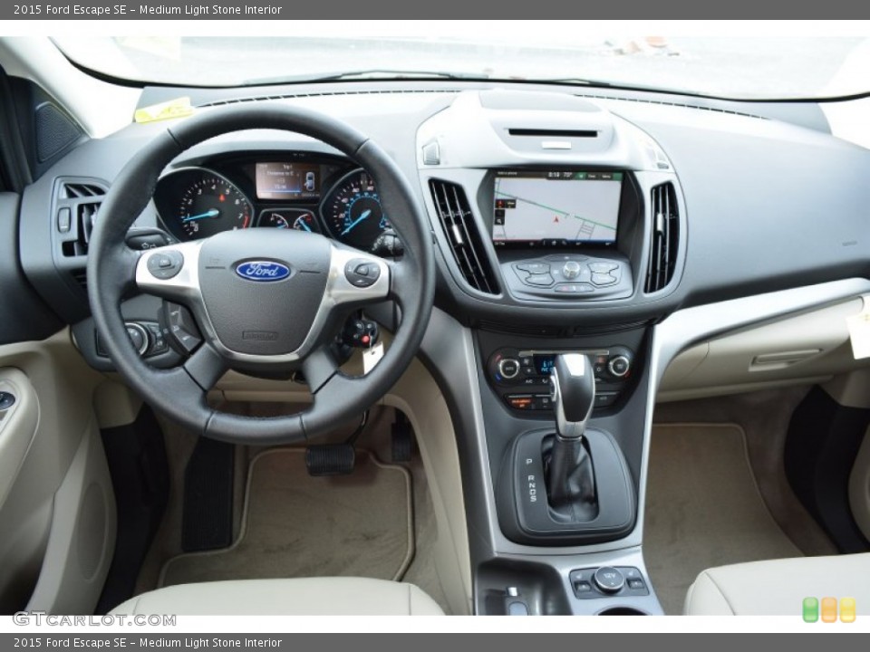 Medium Light Stone Interior Dashboard for the 2015 Ford Escape SE #102087318