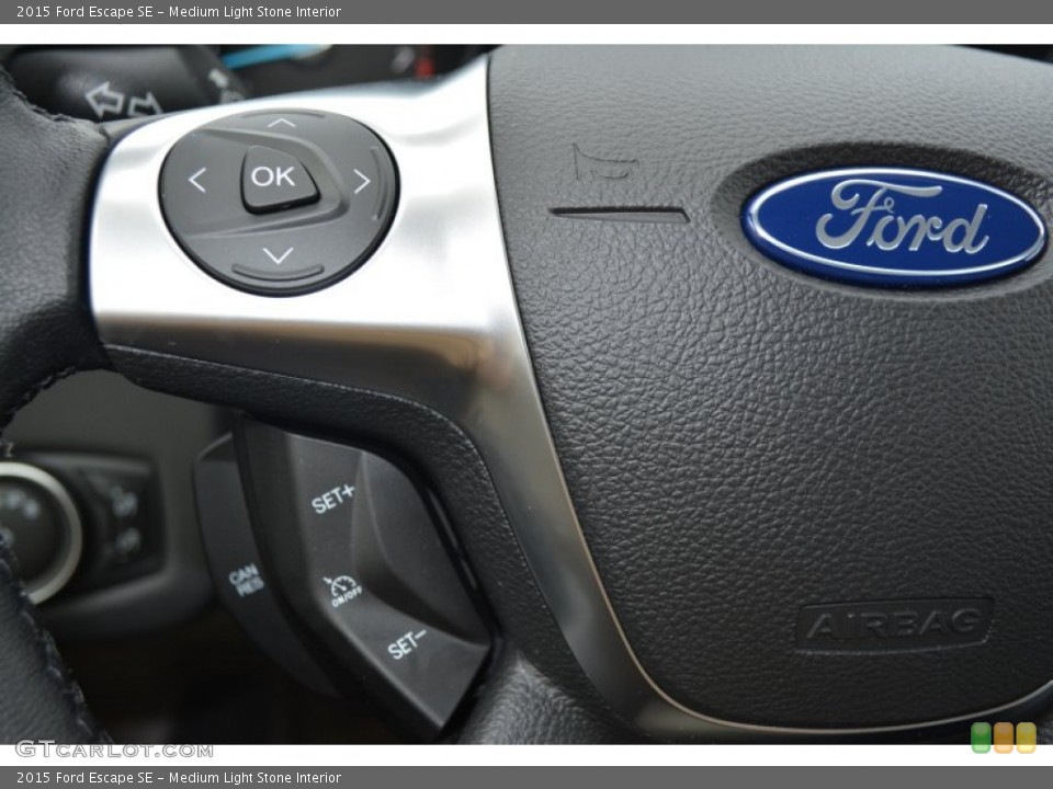 Medium Light Stone Interior Controls for the 2015 Ford Escape SE #102087582