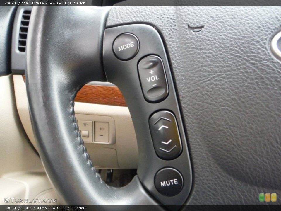 Beige Interior Controls for the 2009 Hyundai Santa Fe SE 4WD #102088032