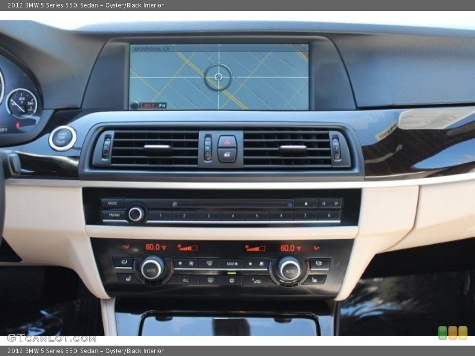 Oyster/Black Interior Controls for the 2012 BMW 5 Series 550i Sedan #102094857