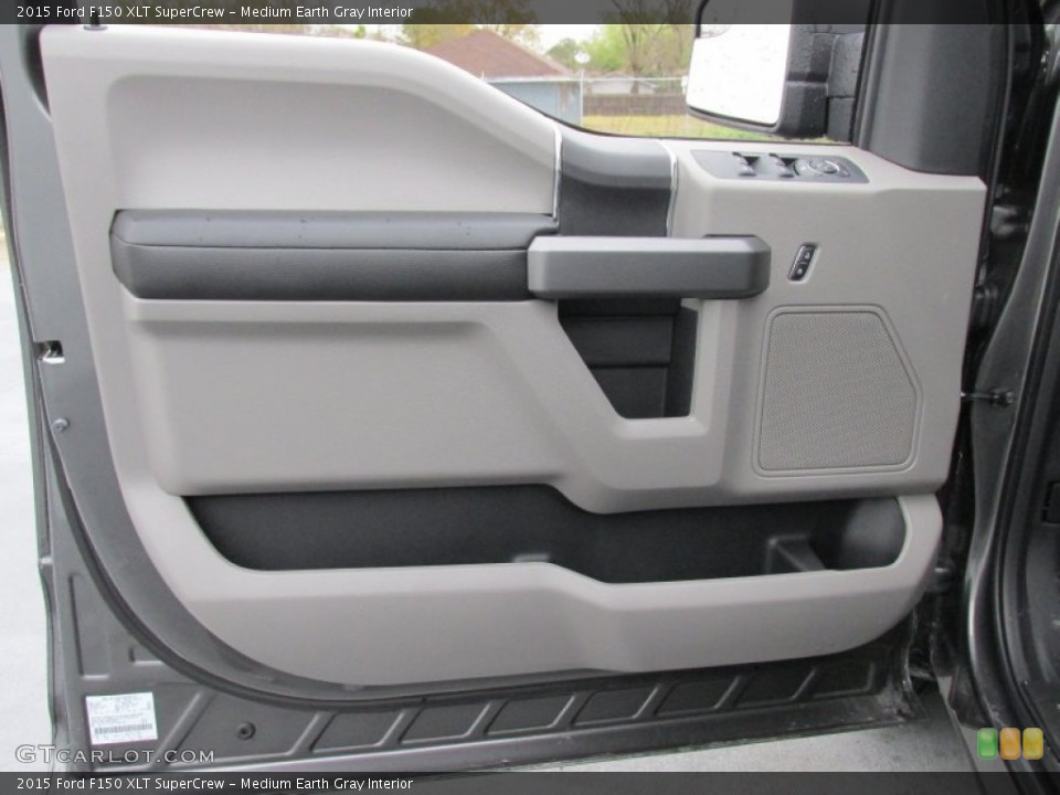 Medium Earth Gray Interior Door Panel for the 2015 Ford F150 XLT SuperCrew #102103941