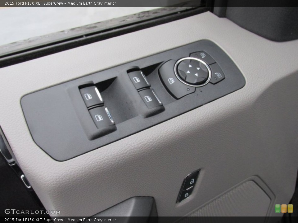 Medium Earth Gray Interior Controls for the 2015 Ford F150 XLT SuperCrew #102103963