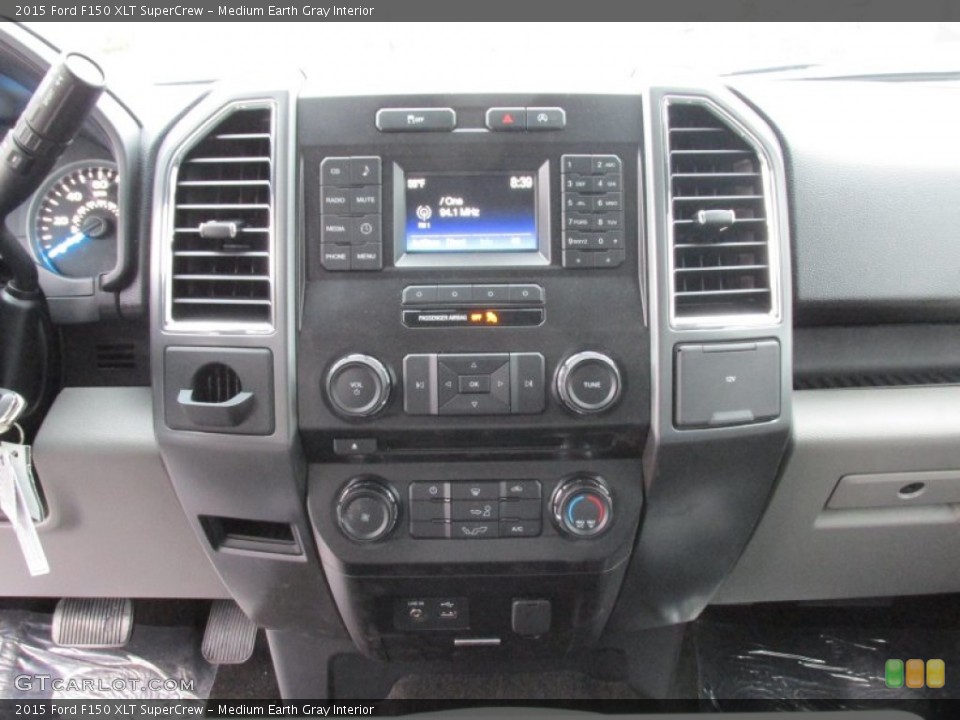 Medium Earth Gray Interior Controls for the 2015 Ford F150 XLT SuperCrew #102104067