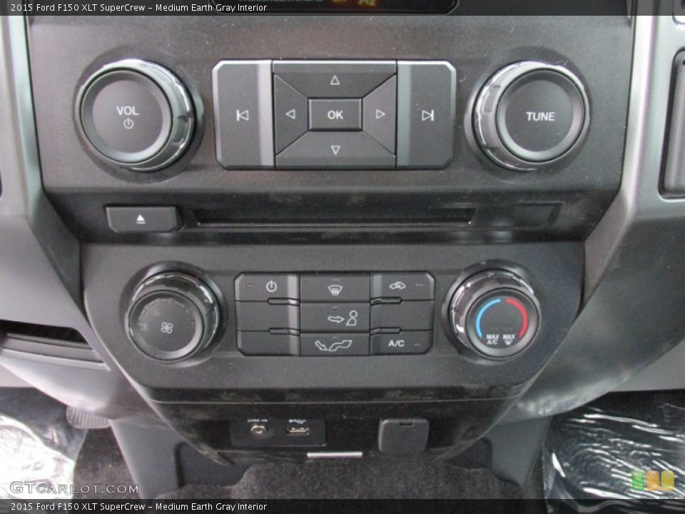 Medium Earth Gray Interior Controls for the 2015 Ford F150 XLT SuperCrew #102104117