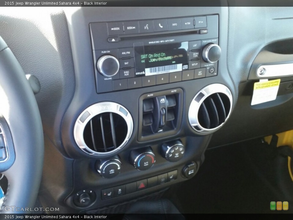 Black Interior Controls for the 2015 Jeep Wrangler Unlimited Sahara 4x4 #102153267