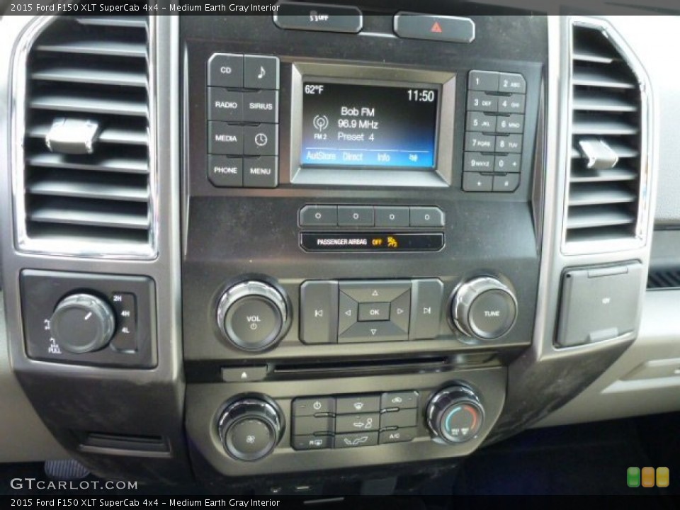 Medium Earth Gray Interior Controls for the 2015 Ford F150 XLT SuperCab 4x4 #102246693