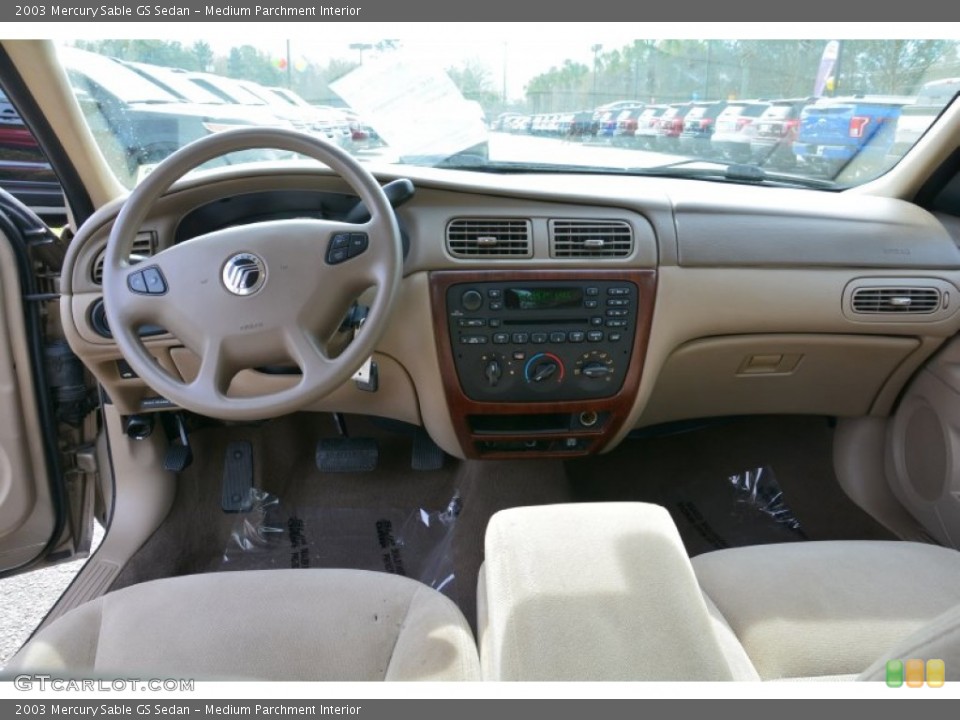 Medium Parchment Interior Dashboard for the 2003 Mercury Sable GS Sedan #102300923