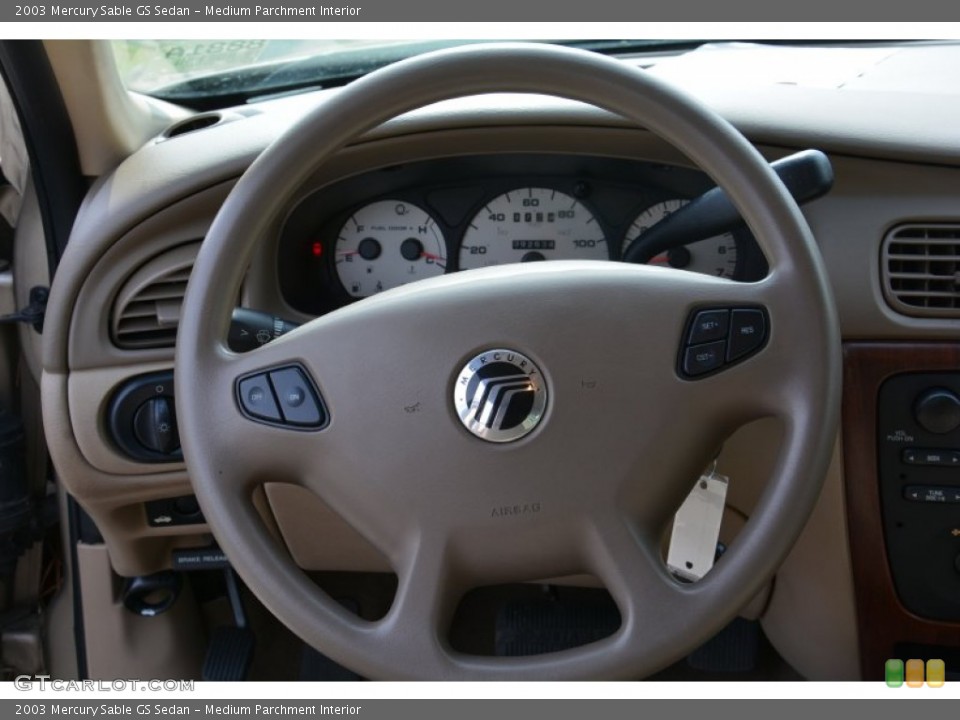 Medium Parchment Interior Steering Wheel for the 2003 Mercury Sable GS Sedan #102300935