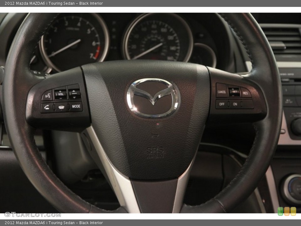 Black Interior Steering Wheel for the 2012 Mazda MAZDA6 i Touring Sedan #102407381