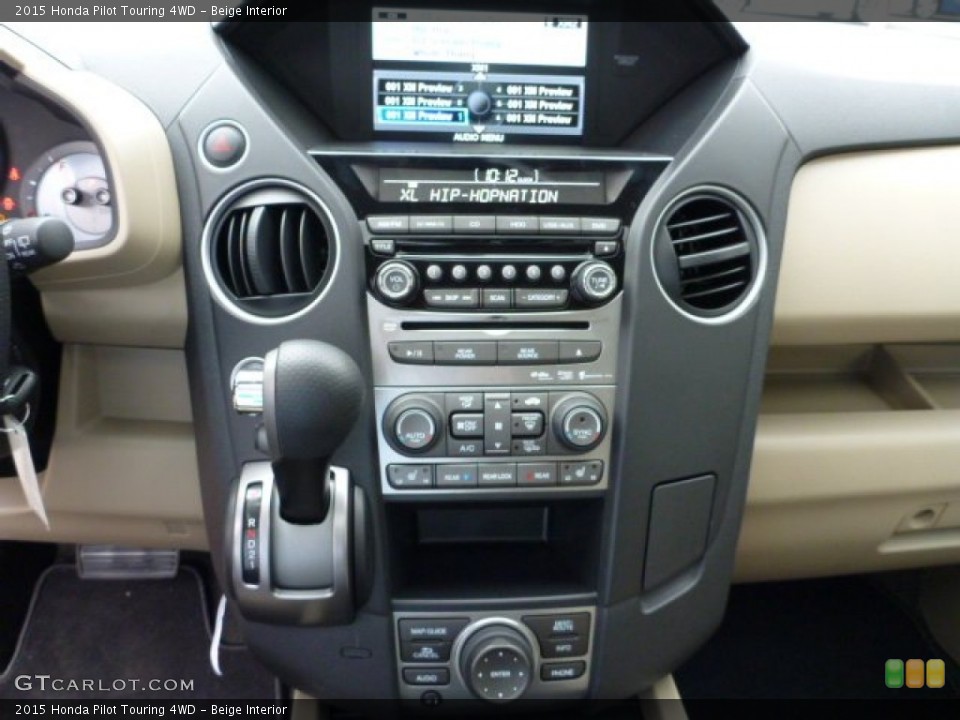 Beige Interior Controls for the 2015 Honda Pilot Touring 4WD #102436562