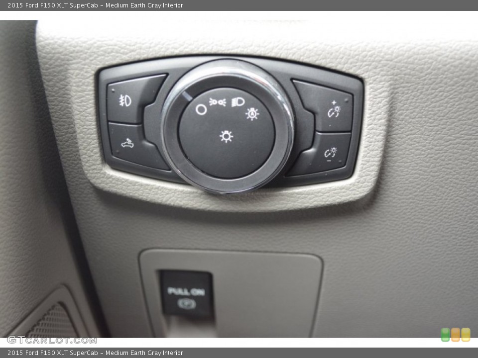 Medium Earth Gray Interior Controls for the 2015 Ford F150 XLT SuperCab #102441862