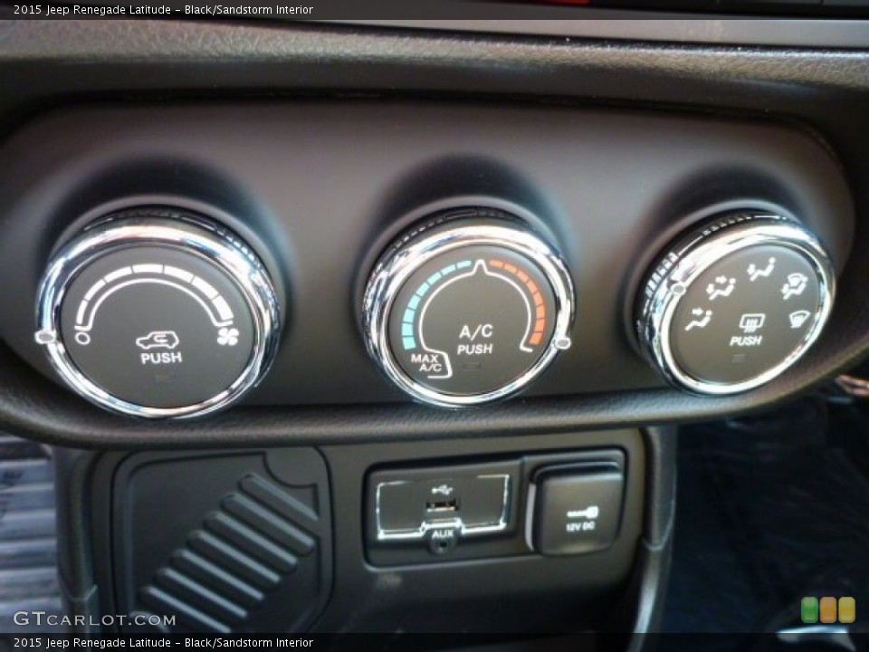 Black/Sandstorm Interior Controls for the 2015 Jeep Renegade Latitude #102450208