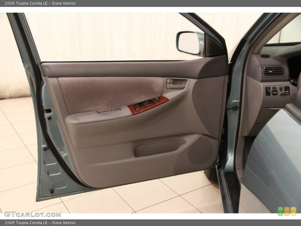Stone Interior Door Panel for the 2006 Toyota Corolla LE #102780305