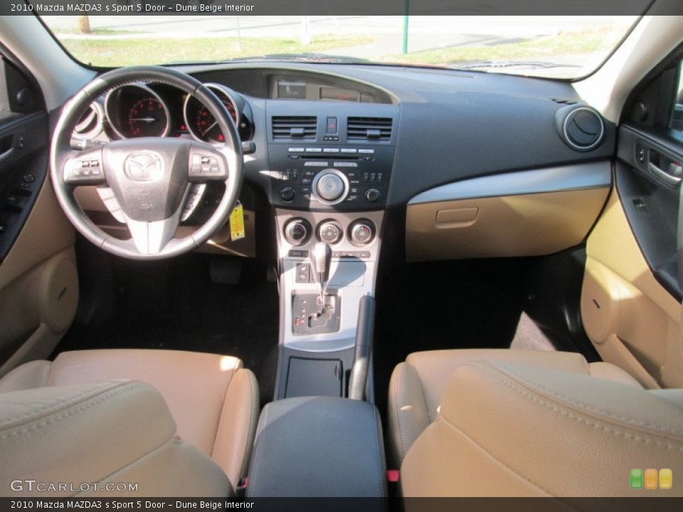 Dune Beige Interior Dashboard for the 2010 Mazda MAZDA3 s Sport 5 Door #102838381
