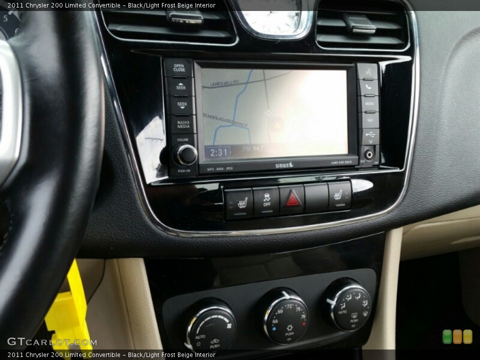 Black/Light Frost Beige Interior Controls for the 2011 Chrysler 200 Limited Convertible #102881451