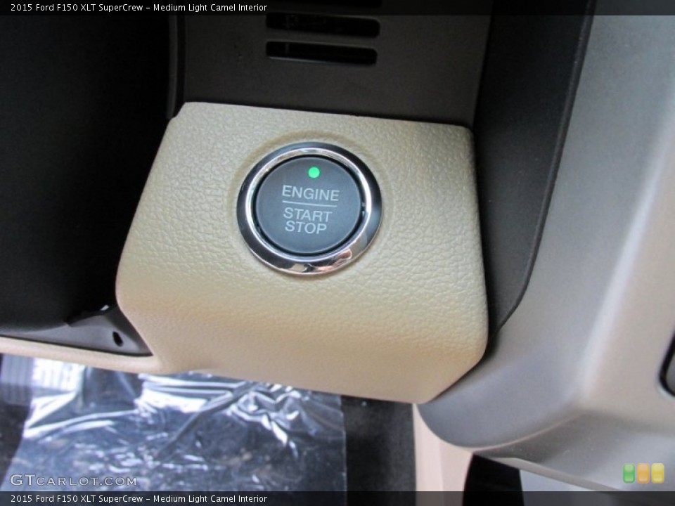 Medium Light Camel Interior Controls for the 2015 Ford F150 XLT SuperCrew #102893788