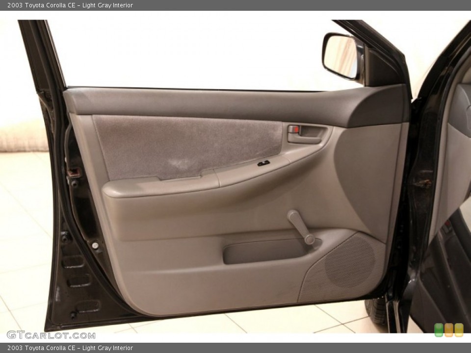Light Gray Interior Door Panel for the 2003 Toyota Corolla CE #102927881