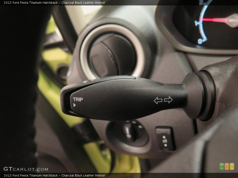 Charcoal Black Leather Interior Controls for the 2013 Ford Fiesta Titanium Hatchback #103026198