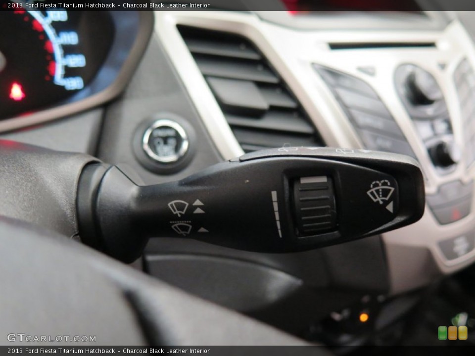 Charcoal Black Leather Interior Controls for the 2013 Ford Fiesta Titanium Hatchback #103026219