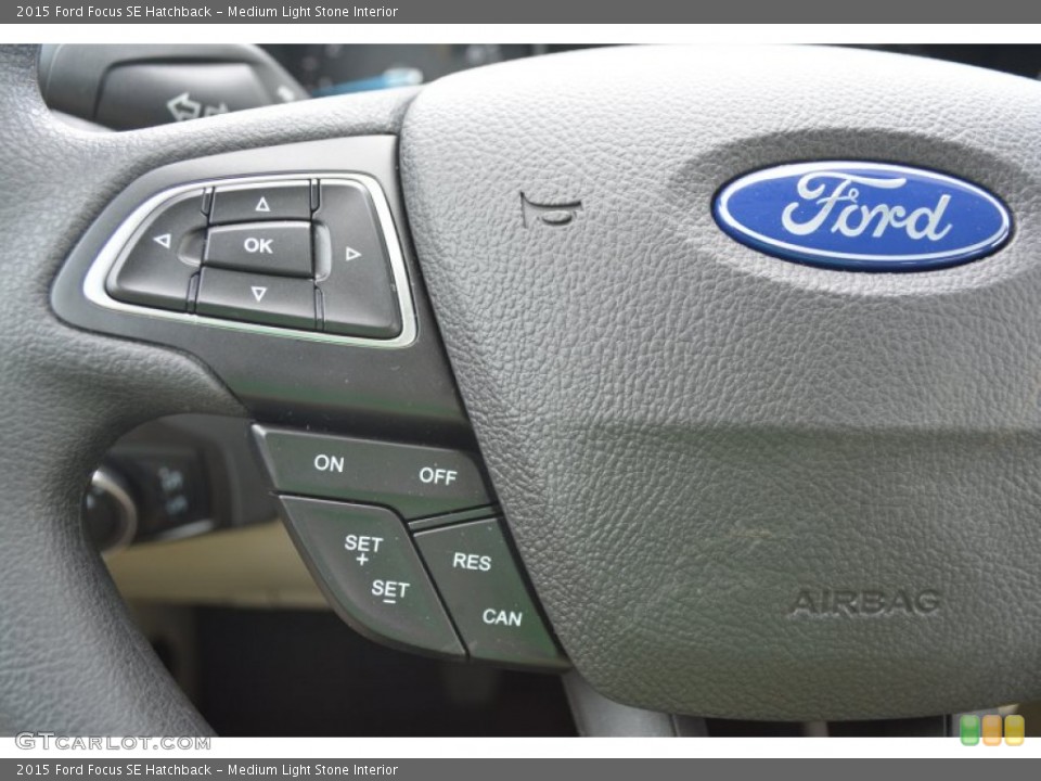 Medium Light Stone Interior Controls for the 2015 Ford Focus SE Hatchback #103028403
