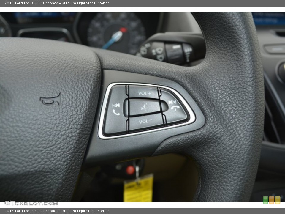 Medium Light Stone Interior Controls for the 2015 Ford Focus SE Hatchback #103028424