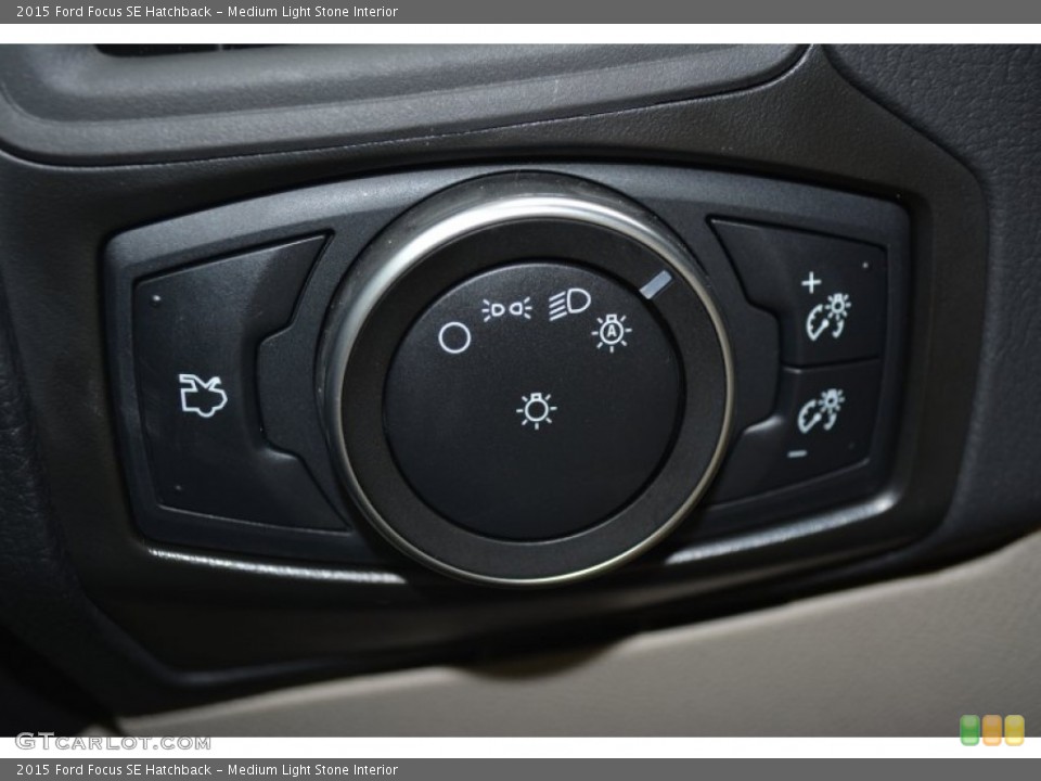 Medium Light Stone Interior Controls for the 2015 Ford Focus SE Hatchback #103028454