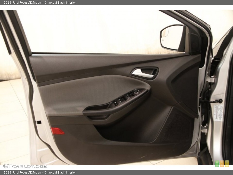 Charcoal Black Interior Door Panel for the 2013 Ford Focus SE Sedan #103033755